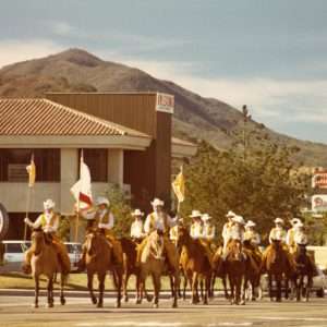 Parade held in conjunction with the De Anza Expedition reenactment, which came through Ventura County on Feb. 23, 1976.  This was part of Thousand Oaks's United States Bicentennial celebrations.  Conejo Valley held a parade and encampment in the Triunfo (Westlake) area on Feb. 22, 1976. ETI riders, and horse and wagon entries on Thousand Oaks Blvd., near Dupars.  LHP04086i.  Were happy to share this digital image on Flickr. Please note that certain restrictions on high quality reproductions of the original physical version may apply. For information regarding obtaining a reproduction of this image, please contact the Special Collections Librarian at specoll@tolibrary.org