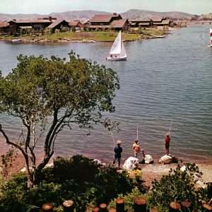Three unidentified boys fishing in Westlake, with two small sailboats in front of new homes on the Westlake Island development. Circa the late 1960s, this transparency was taken for real estate advertising.  Photographer unknown.  LHP00010.  CTO_077.  Were happy to share this digital image on Flickr. Please note that certain restrictions on high quality reproductions of the original physical version may apply. For information regarding obtaining a reproduction of this image, please contact the Special Collections Librarian at specoll@tolibrary.org.