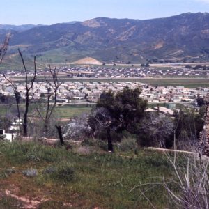 Panoramic view to north, from the property above a burned out house at Alta Vista Rd. and Crown Hill Dr.  Stone chimney is all that is left of the house.  Portion of Knolls Elementary is visible.  Donated by photographer Herb Noseworthy.  CTOnos160 (Color Slide 1025-22) Were happy to share this digital image on Flickr. Please note that certain restrictions on high quality reproductions of the original physical version may apply. For information regarding obtaining a reproduction of this image, please contact the Special Collections Librarian at specoll@tolibrary.org