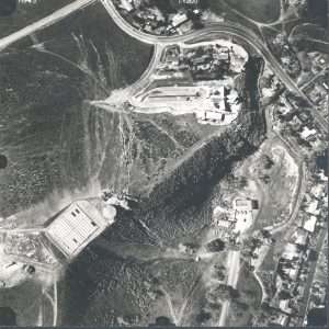 Aerials view of area near St. Patrick's Episcopal Church.  Also shows Old Meadows Recreation Center, and water resevoirs on hill.  Area of El Monte Rd. at Janss Rd. Circa 1970s.  Donated by Mark Williams