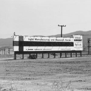 Billboard advertising the Rancho Conejo industrial park and airport. Ventura freeway and Borchard overpass in background. Sign reads, "light manufacturing and research center, a Janss Corporation development" "Conejo Village" "Rancho Conejo airport, Aviation Service Inc., Beechcraft Sales and Service, flight instruction, air taxi".Were happy to share this digital image on Flickr. Please note that certain restrictions on high quality reproductions of the original physical version may apply. For information regarding obtaining a reproduction of this image, please contact the Special Collections Librarian at specoll@tolibrary.org.