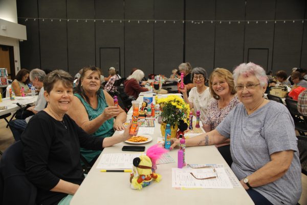 Adults and seniors playing bingo at Goebel Center
